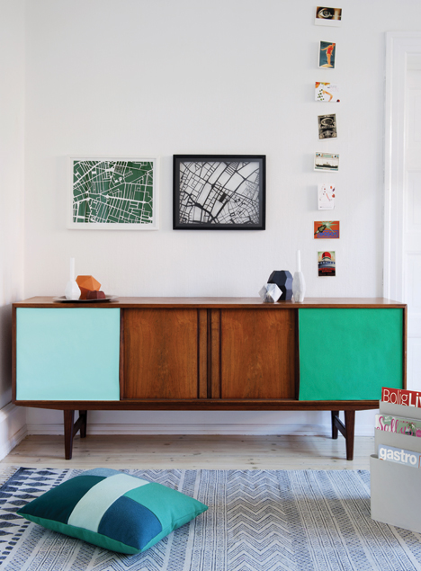 Vintage sideboard with painted sliding doors