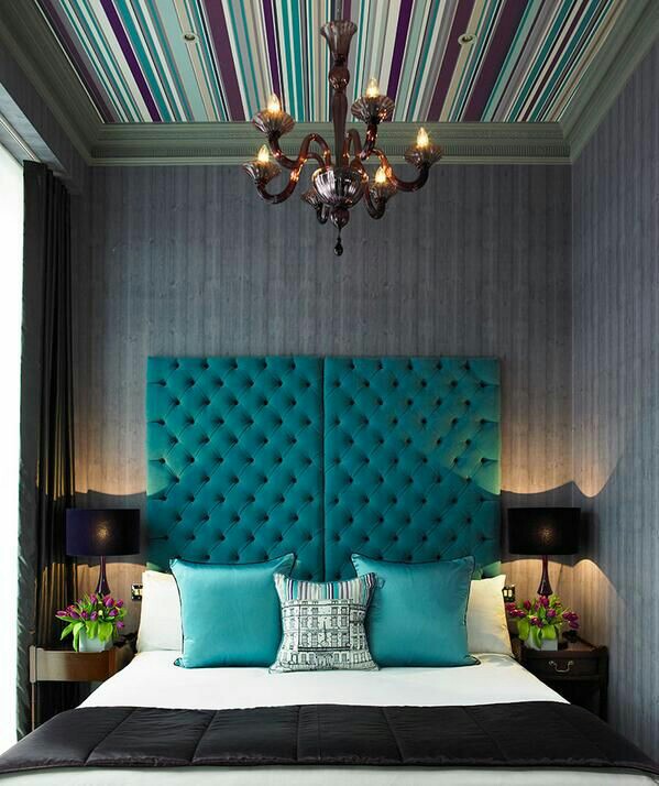 High blue upholstered bedhead