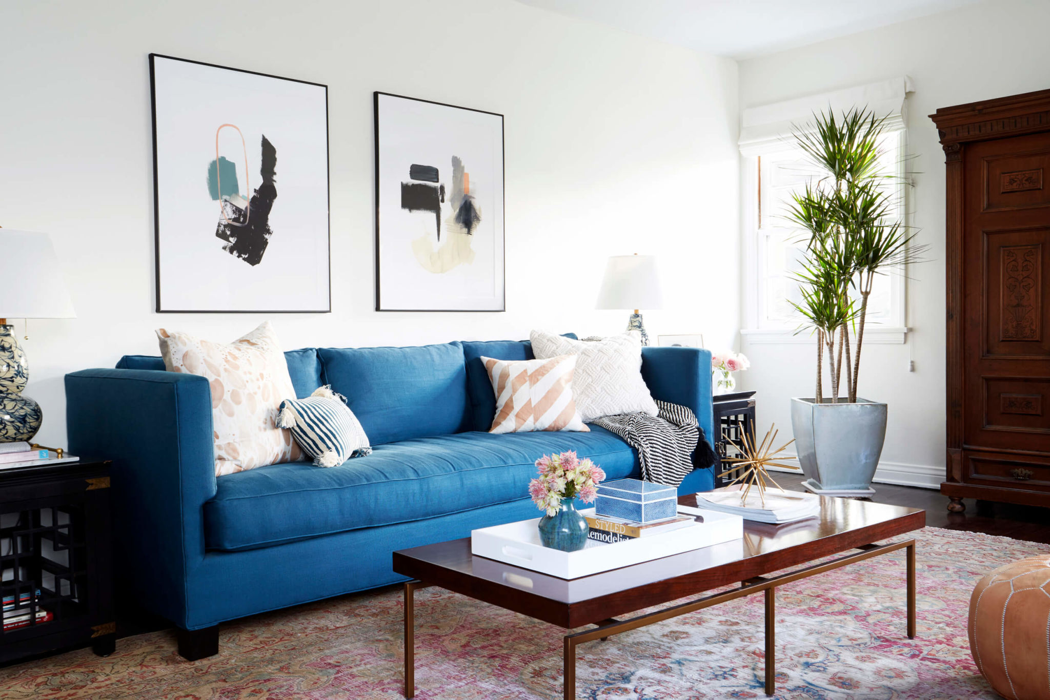 Blue statement sofa against neutrals