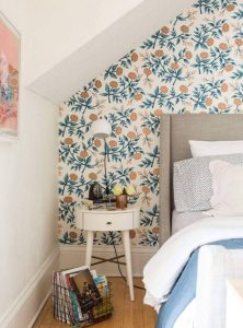 Floral statement wallpaper in a bedroom