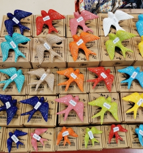 Colourful ceramic swallows
