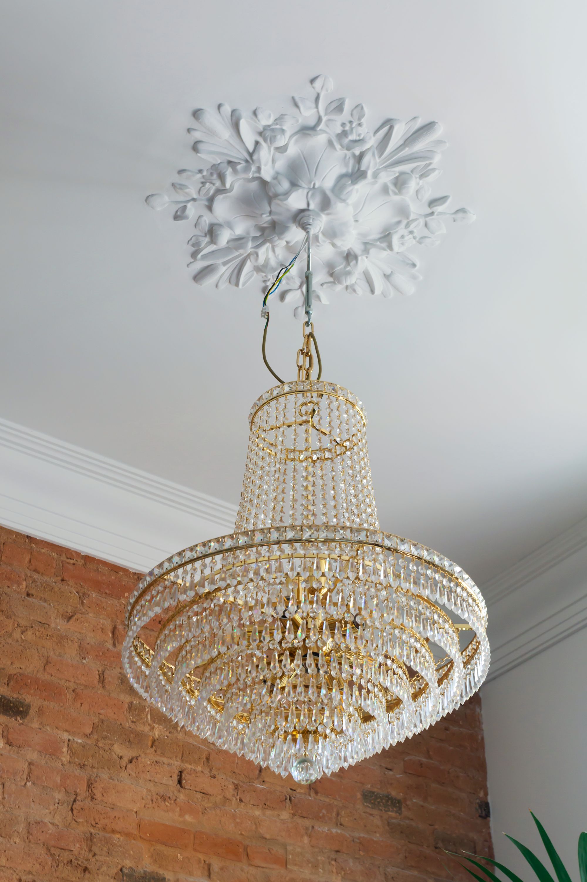 Gemma Barcelona Home Tour chandelier with floral molding