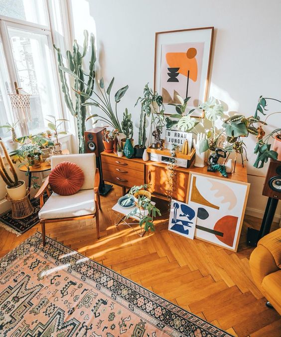 @restyleart Jan Skacelik's bohemian home packed with rugs, plants and his graphic works