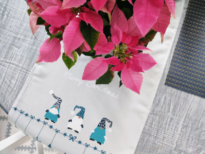 Christmas table runner with poinsettia