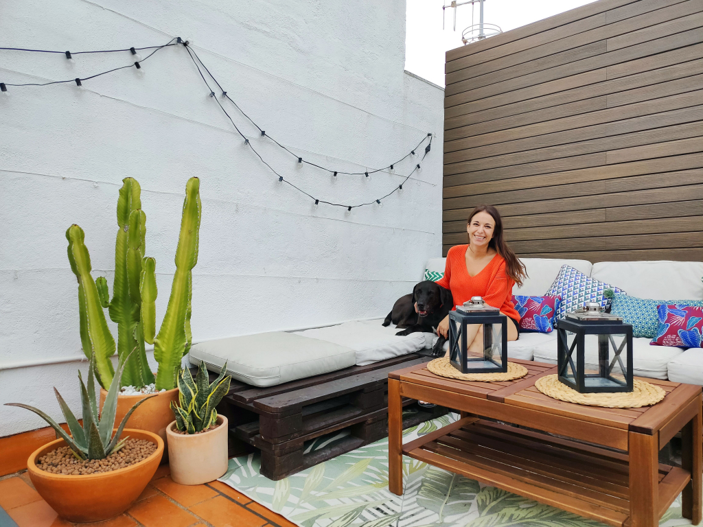 Jordanna Ber with her dog Lomu at her Barcelona terrace