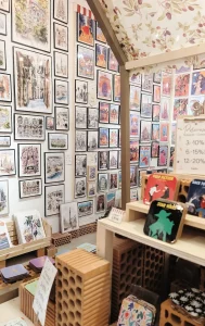 Quirky and eclectic poster wall in Design Place Barcelona.